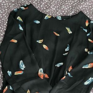 Cute lightweight black a-line dress with feathers